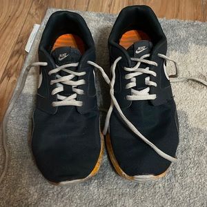 Nike roshe gray with orange and pink geometric design